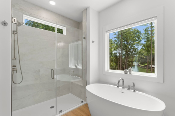 modern, clean and simple bathroom with soaker tub and shower
